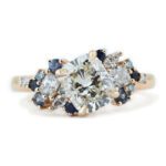 Blue and diamond clustered ring