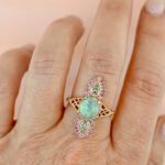 opal-and-pink-sapphire-fairy-ring-aura-on-a-hand