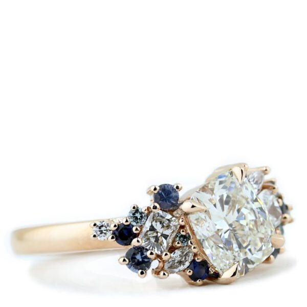 tilted-cushion-diamond-cluster-ring-blue-and-rosy-left-side