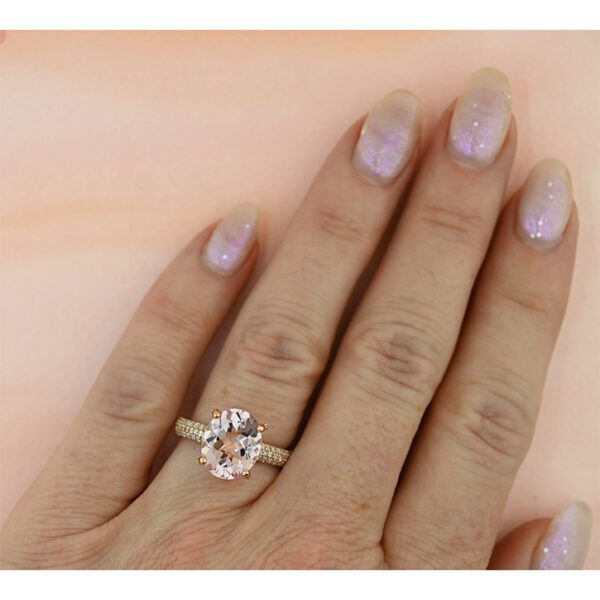 oval-pink-morganite-princess-engagement-ring-princess-pink-on-hand